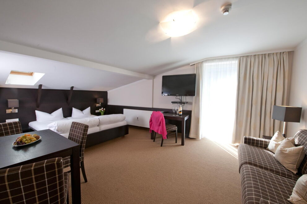 Appartement im Hotel Bierwirt mit karierter Einrichtung